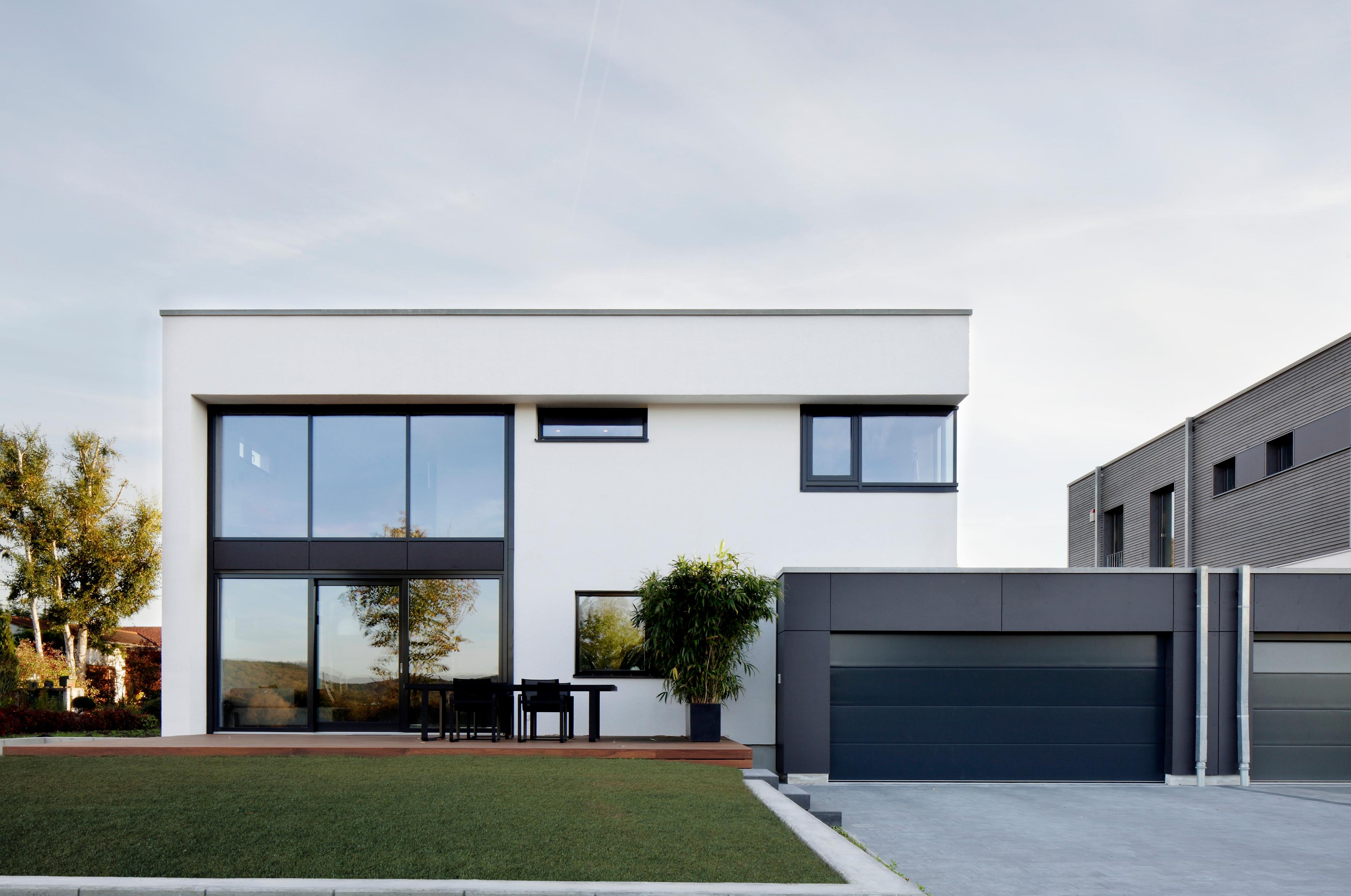 Haus Nilles #flachdach #garage #hausgestaltung ©Baufritz GmbH & Co. KG
