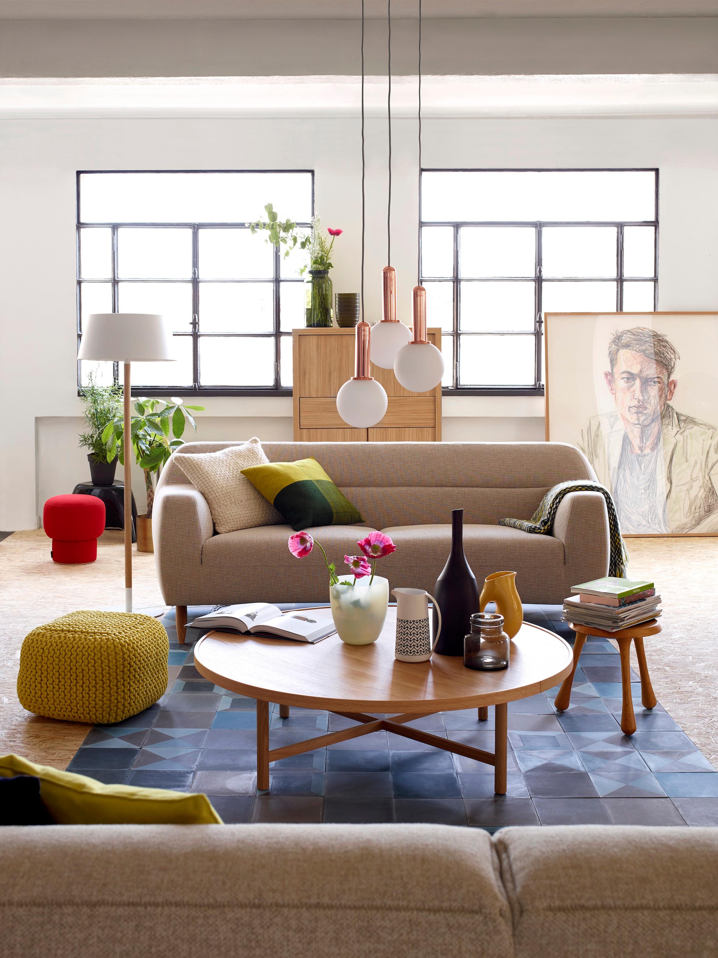 Moderne Sitzgruppe im Wohnzimmer #wohnzimmer #sofa #rundercouchtisch #zimmergestaltung ©Habitat