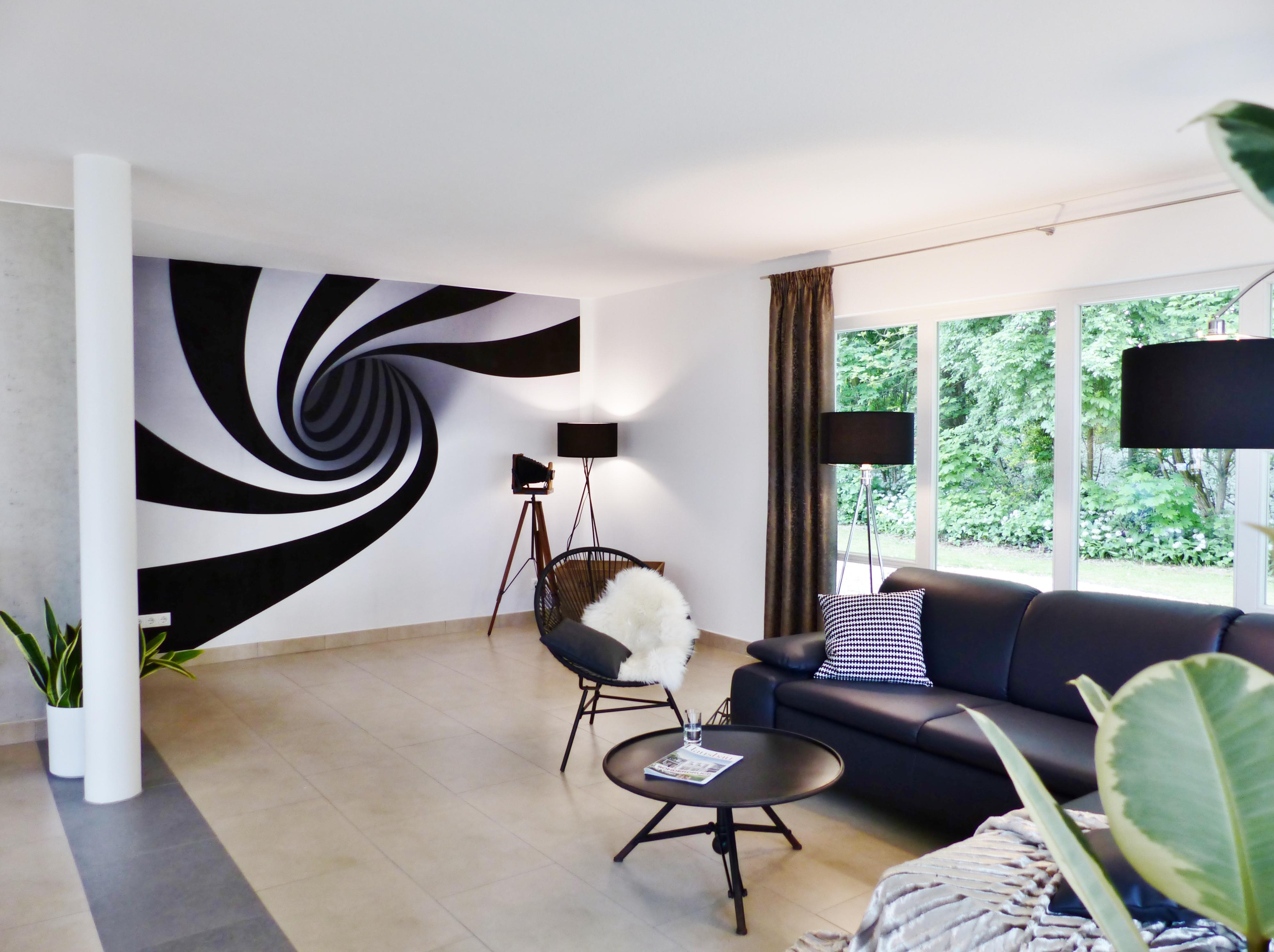 Wohnzimmer mit besonderer Wandgestaltung #einrichtungsberatung ©Immobilien Podium