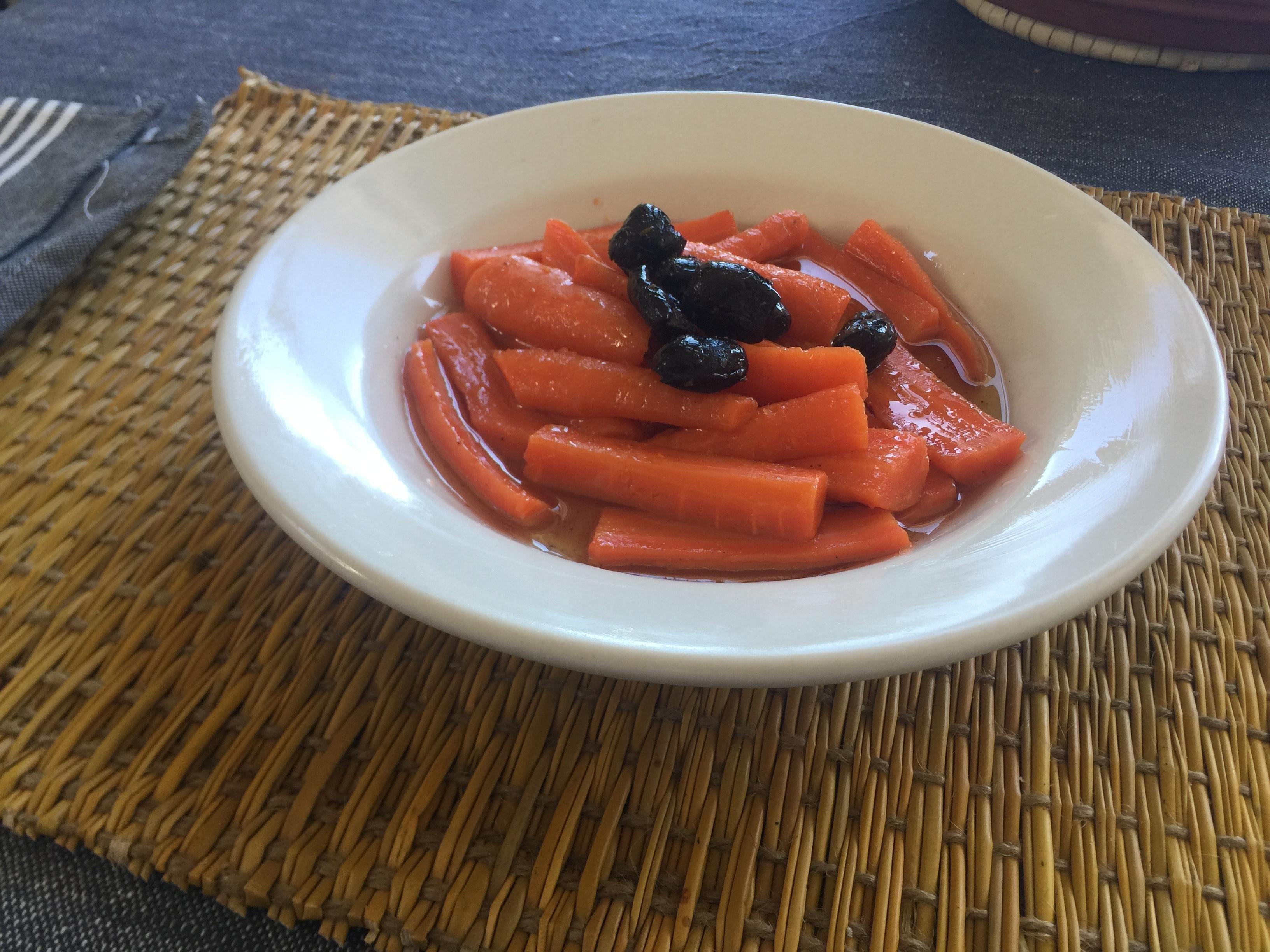 Eat seasonal: carrots' vinaigrette &  cured black olives. You need good bread for this :) 