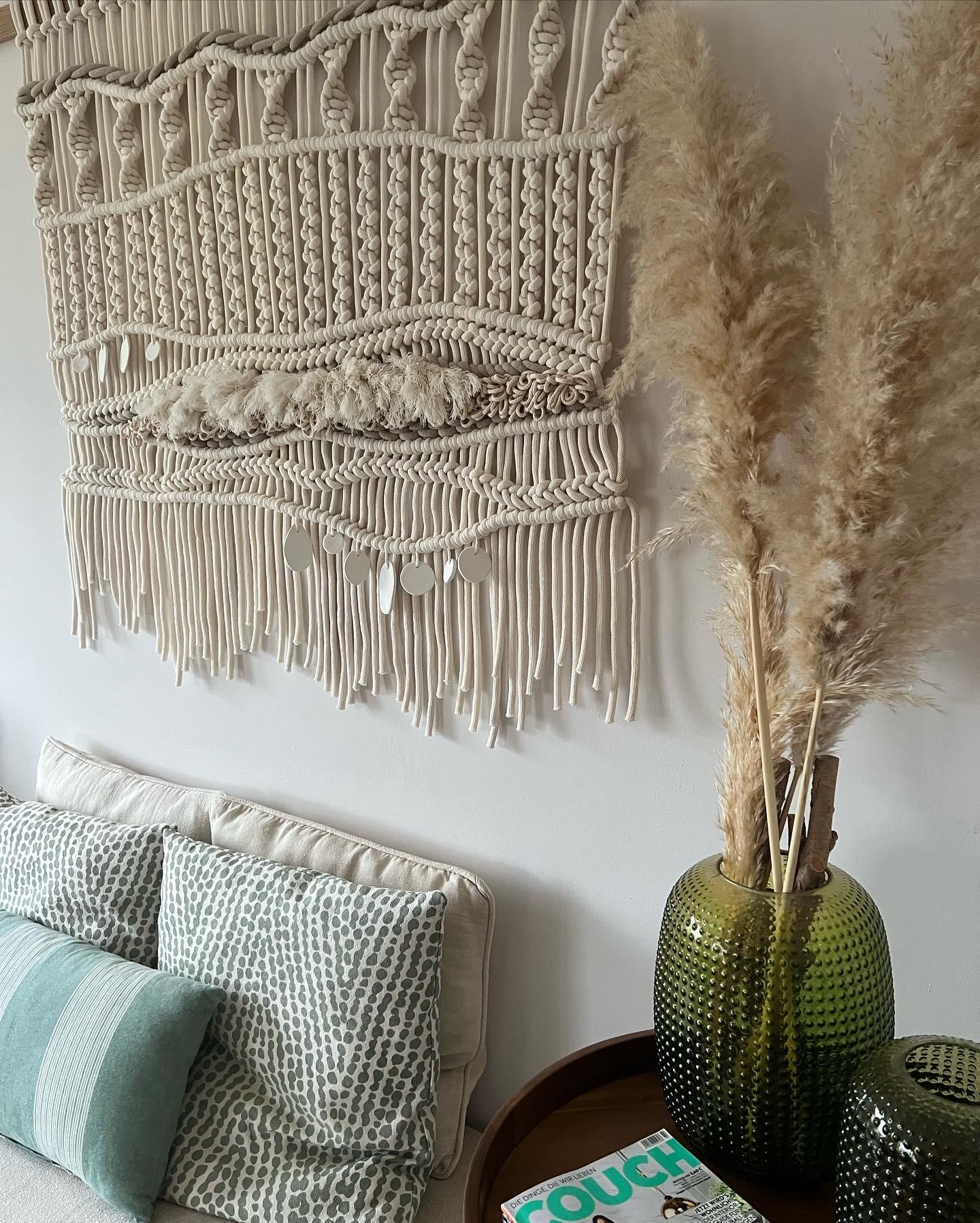 My macramé wall hanging Marycocrafts, natural and monochromatic with couch magazines as part of the deco.