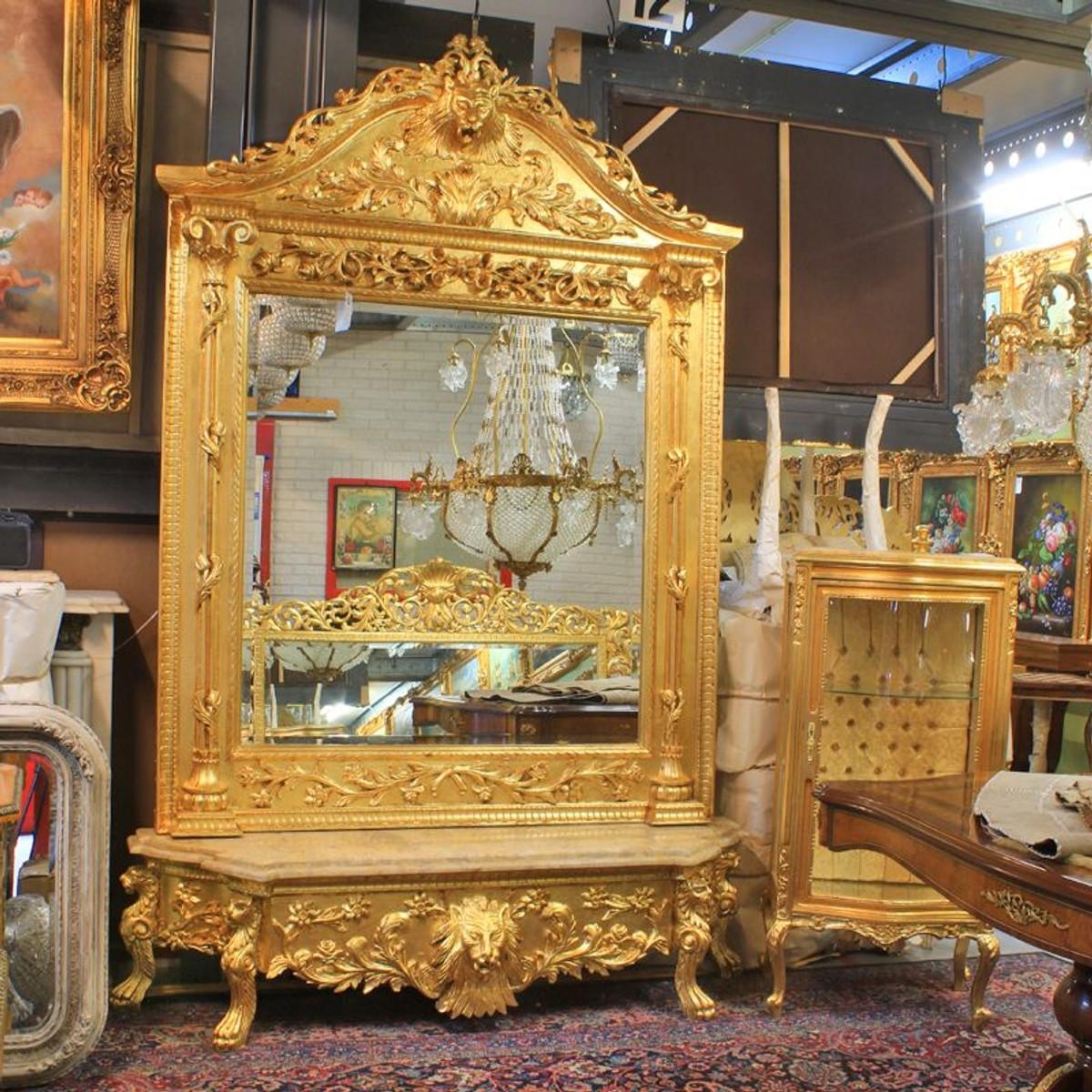 Prachtvolle goldene Spiegelkonsole mit Löwenkopf Schnitzereien von Casa Padrino