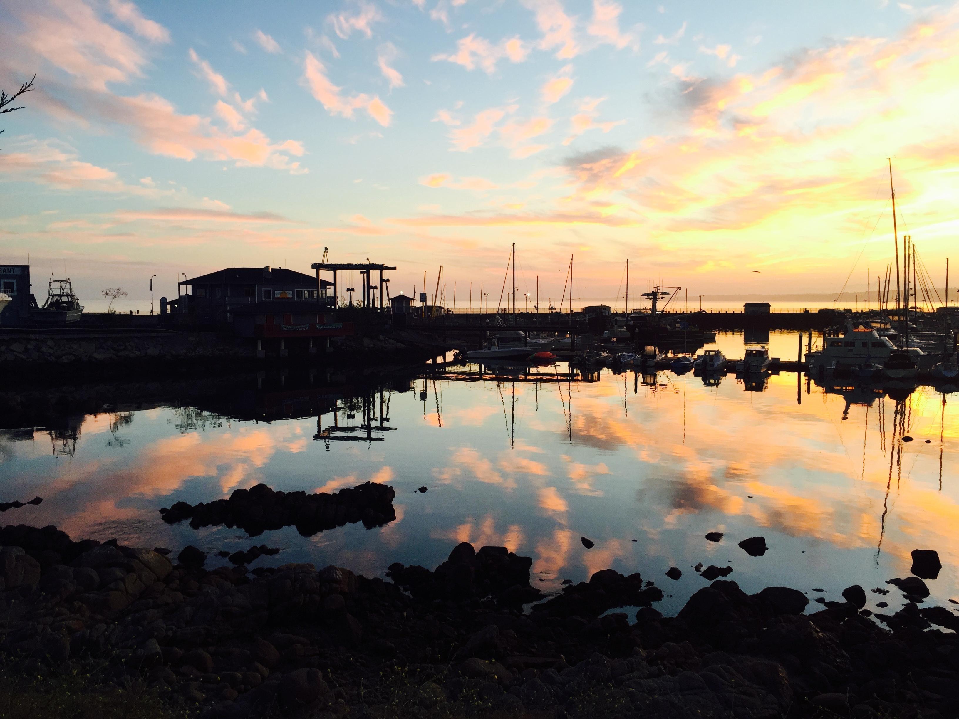 Sunrise reflects into the water, Monterey California 